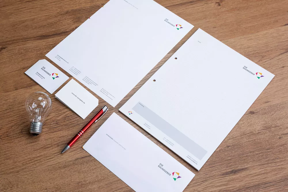 kws werbung - projekt die raumgeber - logo auf briefpapier und visitenkarten