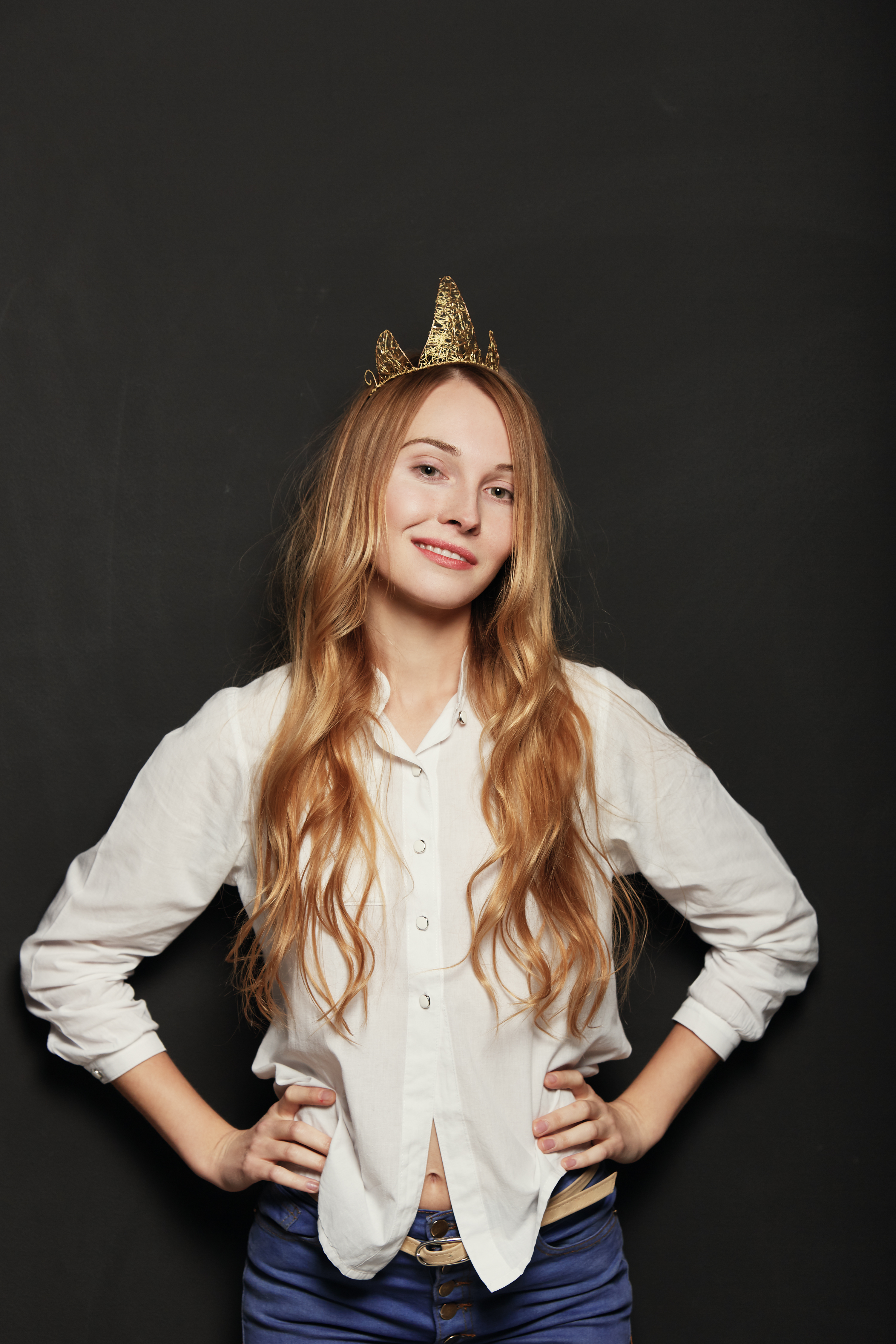 Close Up Portrait Of Adorable Girl With Golden Crown Holding Han